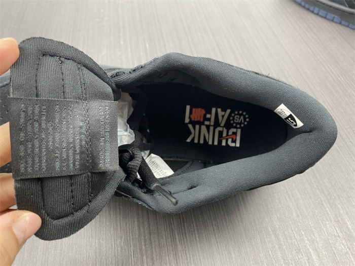 nike dunk low sp undefeated 5 on it black do9329-001