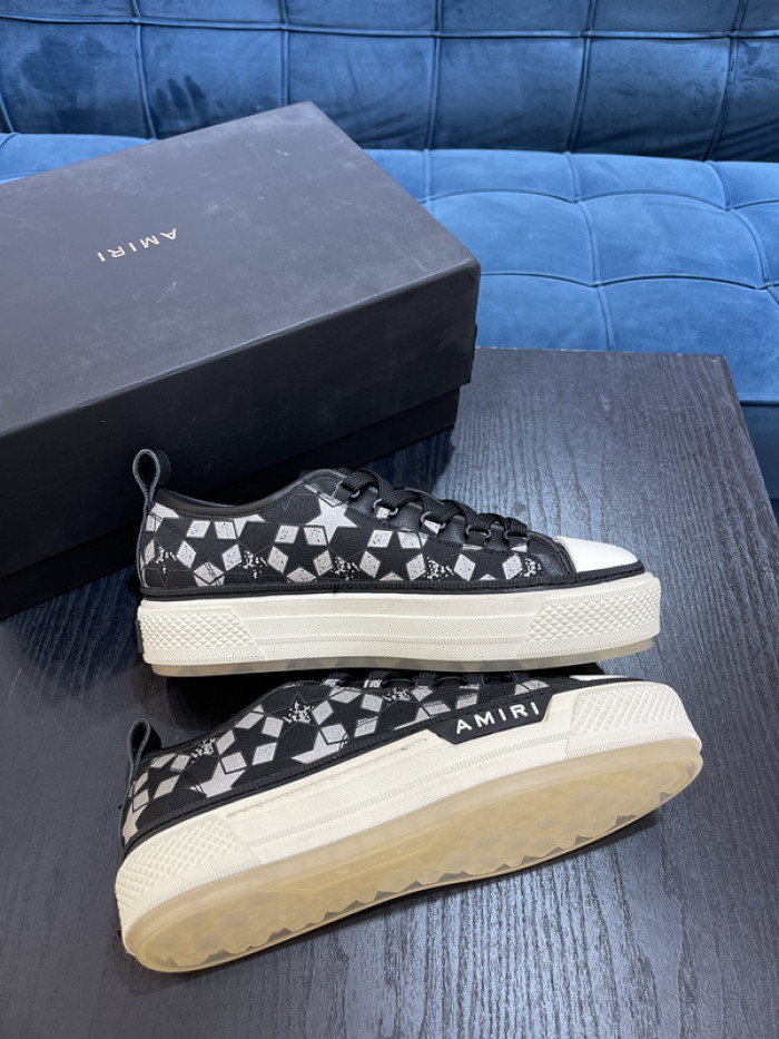 amiri* appliquéd leather and canvas sneakers